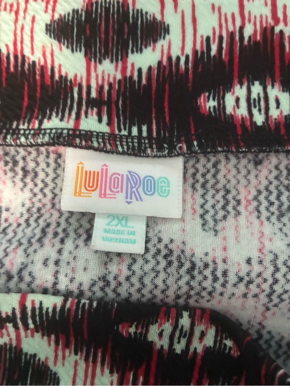LuLaRoe Cassie in Black, Pink and very light mint green Print